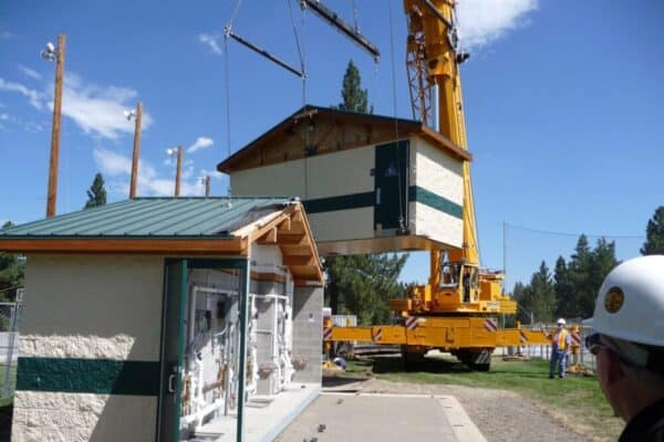 Public restroom being installed with a crane